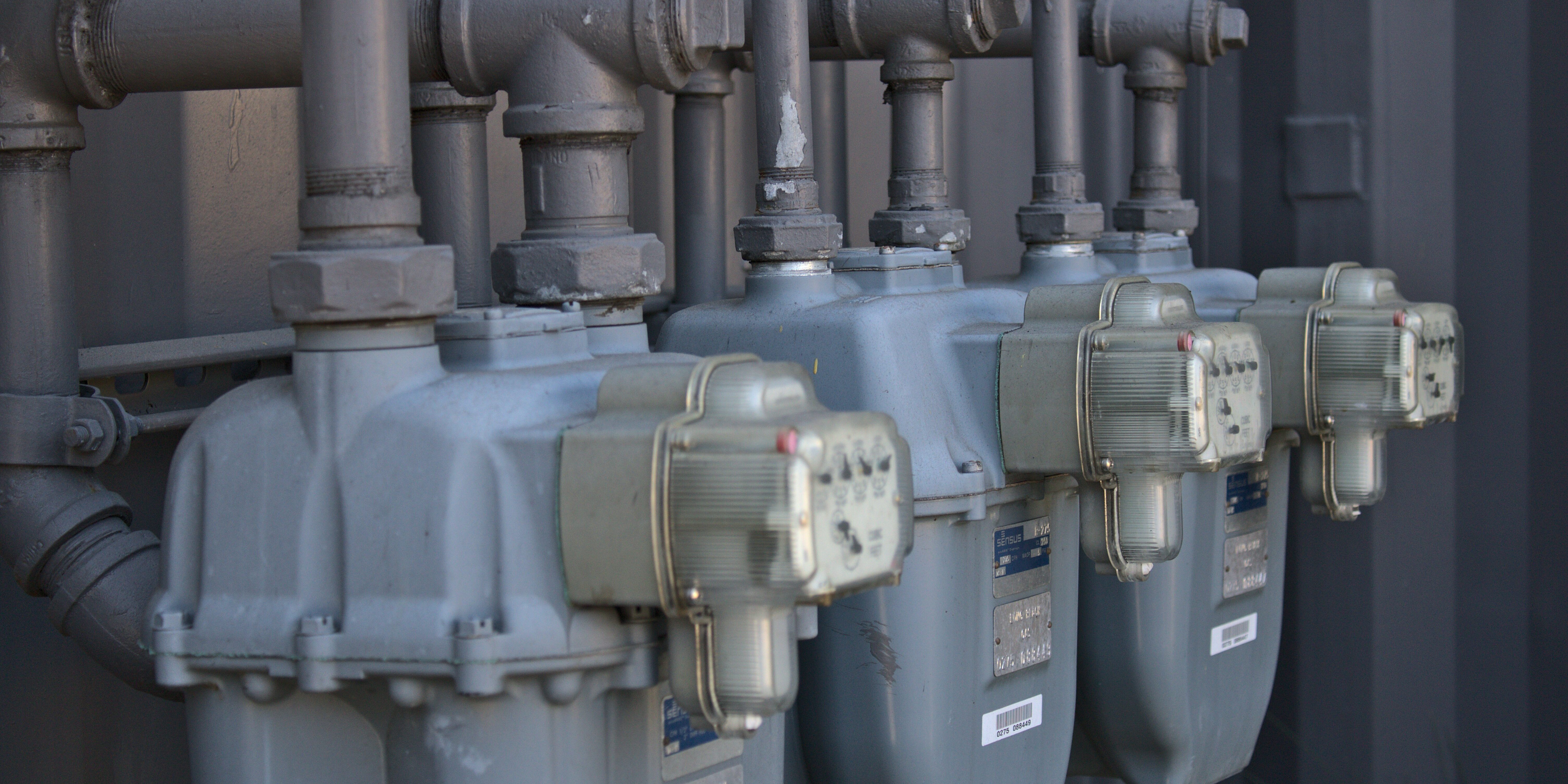 doris-morgan-mXUFJ1U2AeA-unsplash three residential gas meters